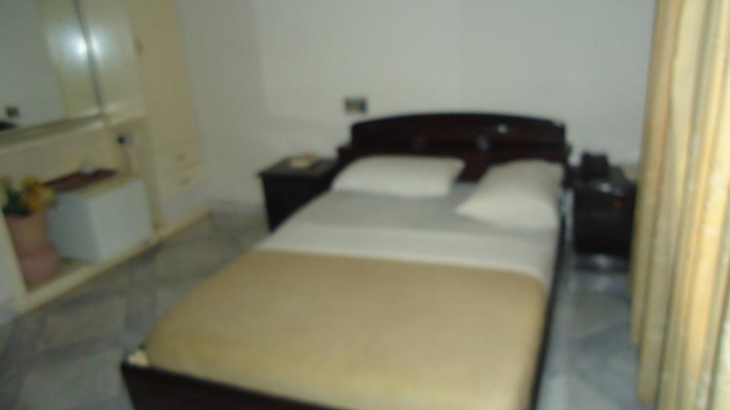 Wadoma Royale Hotel Kumasi Szoba fotó