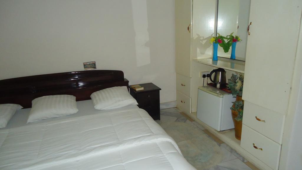 Wadoma Royale Hotel Kumasi Szoba fotó